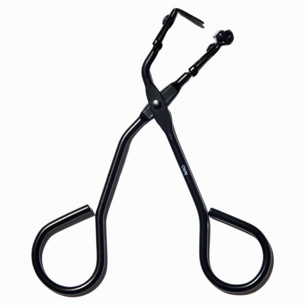 own beauty essentials mini eyelash curler